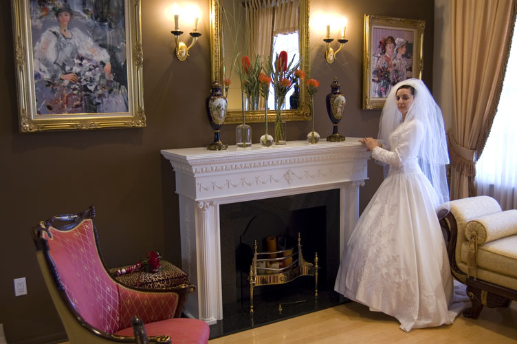 Bride-next-to-fire-place-Halawy Bride-next-to-a-fire-place