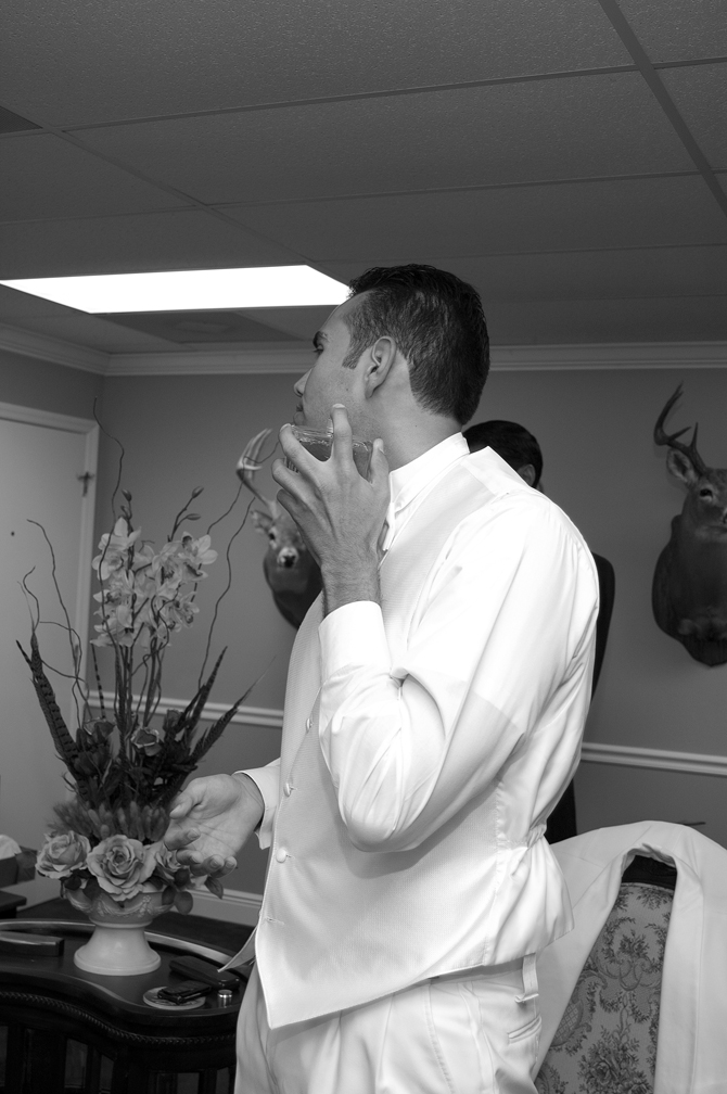 Photograph of a Groom Getting ready for wedding in miami Photograph of a Groom Getting ready for wedding in miami