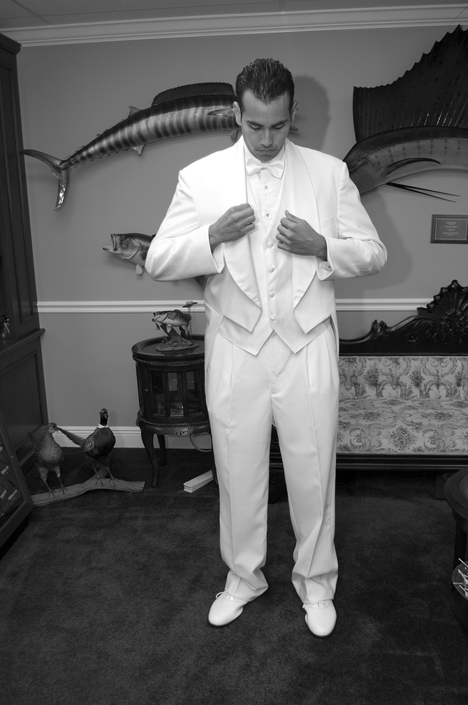 Photograph of a Groom Getting ready for wedding in miami Photograph of a Groom Getting ready for wedding in miami